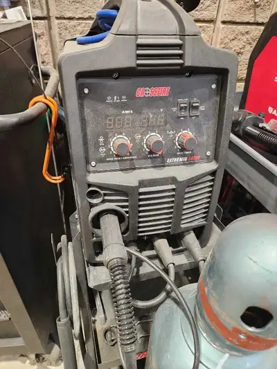 Crossfire mig welding machine. Machine and stand included. In very good shape- it just sits collecti...