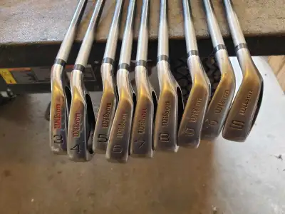 Selling a set of Wilson Fat Shaft golf clubs, perfect for improving your game! This set includes iro...