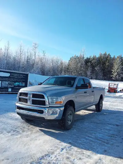 I am selling my diesel truck with 200k! SLT trim. Brand new box linexed with color match paint. Call...