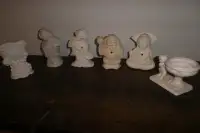6 Figurines en porcelaines 3 x 3 x 8,5 pouces de haut1$ pour