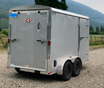 Clean, well-maintained 6’ x 12’ enclosed cargo trailer. This trailer has been used for transporting...