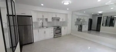 Beautifully renovated two-bedroom + Den basement apartment located near Kennedy and Danforth. The un...