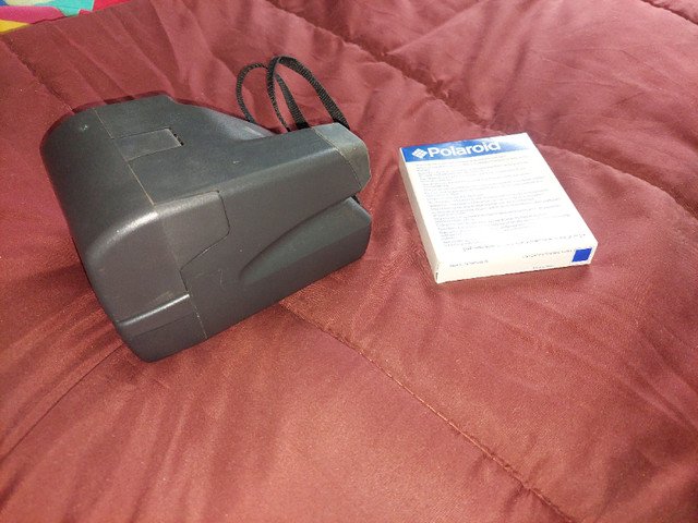 Polaroid Camera with 1 Package of Film in Cameras & Camcorders in Ottawa - Image 3