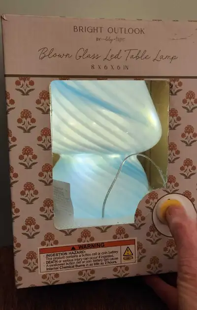 Brand new, never used, still in box. Crafted from durable glass with soft ambient lighting and grace...