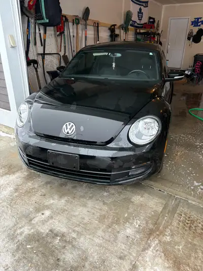 This is a black Volkswagen Beetle with 92028 km. Please note that this vehicle is in used condition....