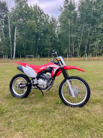 for sale or trade is a 2020 crf250f great bike for beginners or if you just like to trail ride and h...