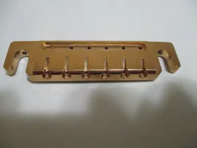 ABM brass wrap around bridge, View more