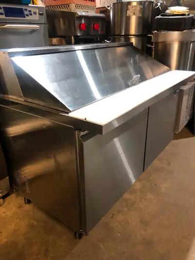Omcan 5’ refrigerated prep table, 2 door Mega top complete with inserts and lid, Cutting board, cast...
