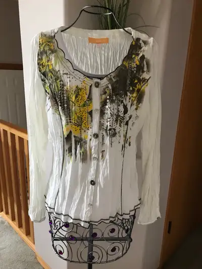 New without tags. Never worn. Paid $80 Cream Color.