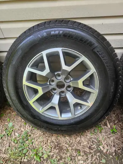 Presenting a set of new Michelin Defender LTX M/S tires, expertly mounted on stylish alloy rims. The...