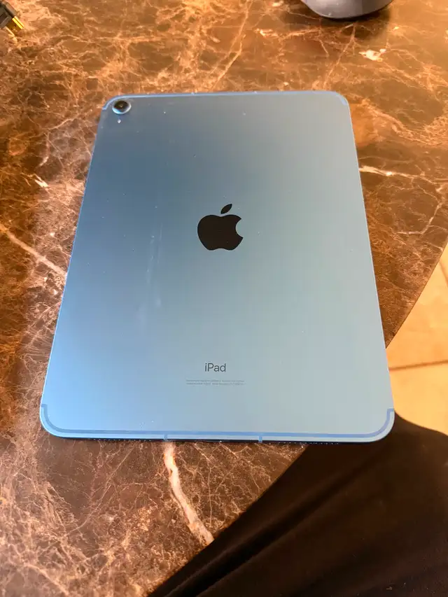 iPad 10th generation barely used. Paid 520.00 a year ago.62863279110915123