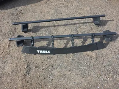 Hi,im selling my thule roof rack off my old hatchback car,in good condition,should fit small cars,et...