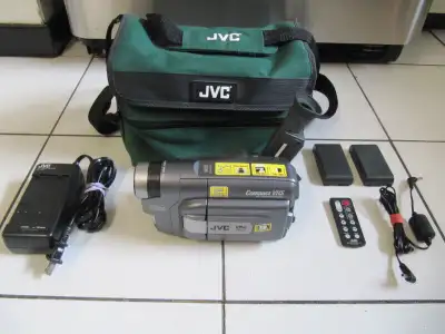 Up for sale is a JVC Model GR-AXM710U VHS-C Compact VHS Pro-cision 5 Head Digital Still Video Camera...