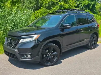 Honda Passport Touring Elite 2019 – 139 683 km, moteur V6 3,5 L, capacité de remorquage de 5 000 lb....
