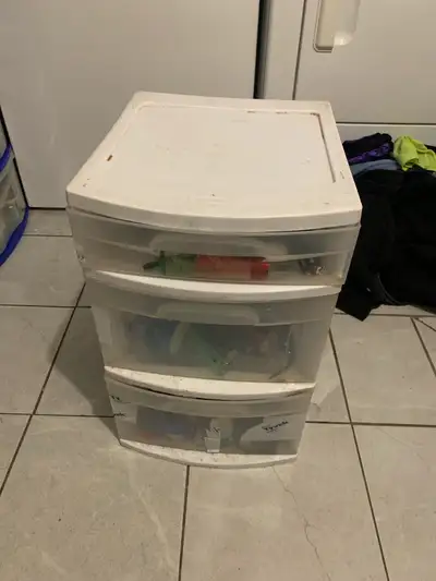 This pre-owned Sterilite 3-drawer plastic organizer comes filled with a large collection of assorted...