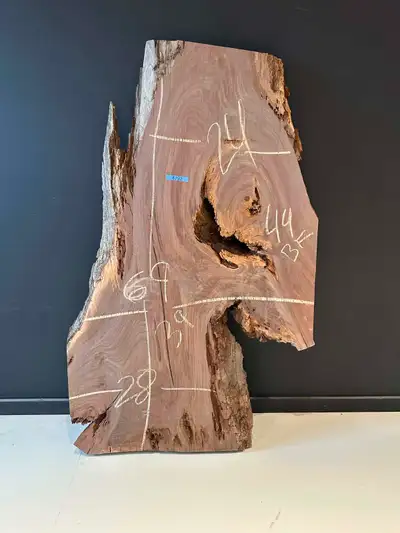 Beautiful live edge black walnut slab with incredible natural character, grain movement, and unique...