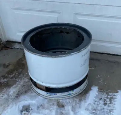 Smokeless fire pit - made out of a steel drum, this will last for years, burns clean and free of smo...