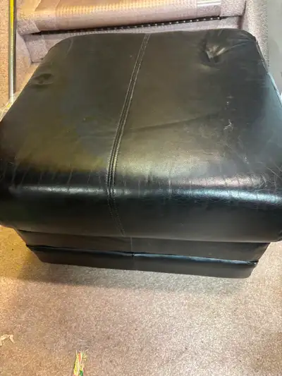 Black leather Ottoman with wheels 24x24 inches wide by 16 inches, View more