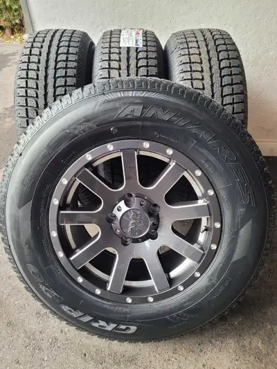 BRAND NEW265 70 17 Anteres grip snow tires on. 17" ENVY Aluminum Rims, 5x139.7 bolt pattern Fits all...