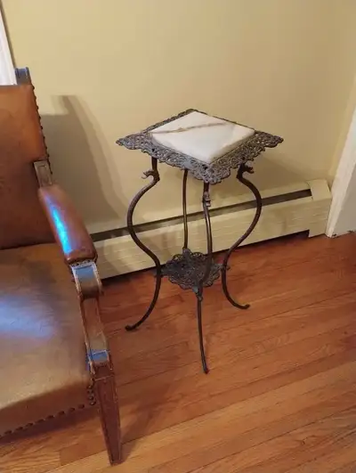 Beautiful unique Victorian style table. This stunning rare item has a bronze gilded iron finish. The...