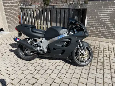 1998 Gsxr750 matte black with grey reflective decals, fast bike. Stainless steel braided lines, full...