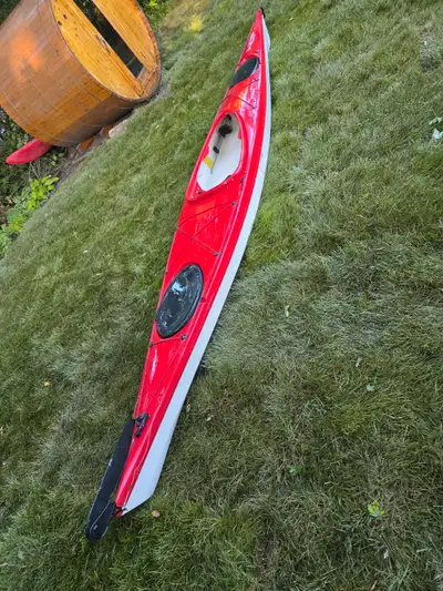 15-foot fiberglass sea kayak, fitted spray skirt and water pump included. Incredibly lightweight, th...