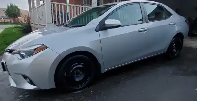 Toyota Corolla LE Upgrade 2015 Comes with alloy wheels and winter tires on separate steel rims. Movi...
