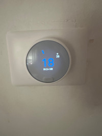 Google Nest thermostat E snow with trim plate