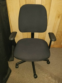 Adjustable high end office chair. Black fabric.