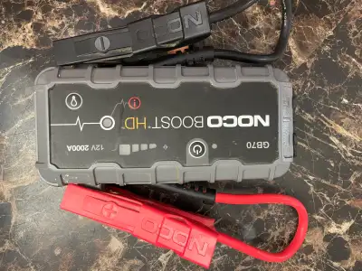 This is a slightly used NOCO Boost HD GB70 2000A Jump Starter, perfect for jump-starting vehicles wi...