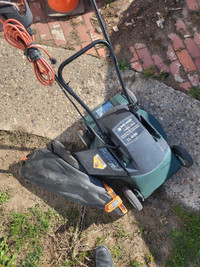 Plug in electric lawn mower