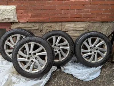 These are used all-season tires, size 205/55R16, mounted on rims, ready to go for the this season. T...