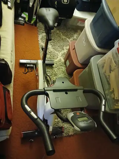 This is a working Chaoke indoor exercise bike. It has an adjustable seat and handlebars. The console...