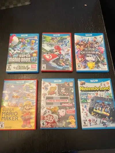 6 Wii u games **NES REMIX pack - 30** **Super Smash Bros - 20** **Mario Kart 8 - 25** **Super Mario...