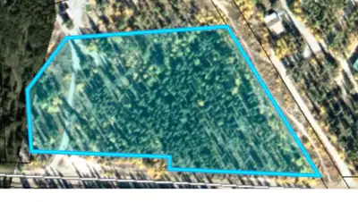 5 Acres- Treed country residential lot for sale just outside of city limits on the North Klondike hi...