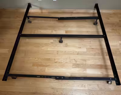 Queen Bed Frame Metal Construction. Great condition. Pick up in Canmore