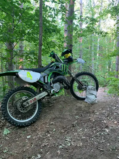 Get ready to tear up the trails with this 2001 Kawasaki KX 125, a powerful and agile dirt bike that...