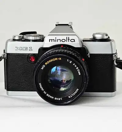 Minolta XG-1  SLR 35mm Film Camara W / 50mm F/ 2, View more