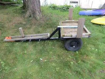 Small trailer for moving kayaks and canoes to and from the lake