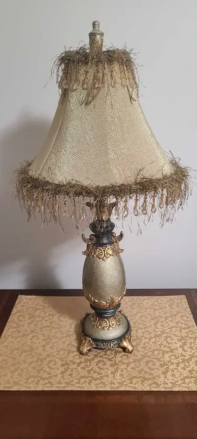 Two (greenish) lamps - 25" height for 25 each Single (silver) lamp - 31" height for 35