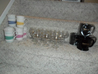12 wine glasses $18. 4 Sk Energy mugs $6. 7 striped mugs $10. Al