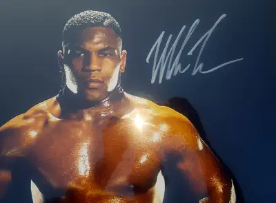 Huge signed and framed 16x20 photo of Iron Mike Tyson in his rookie years. Rare photo. Autograph has...