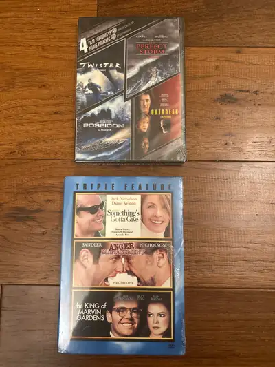 Brand new factory sealed – 4 DVD movie collection. The movies are twister, the perfect storm, Poseid...