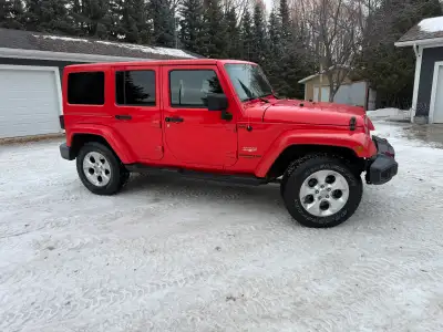 2013 Jeep Sahara JKU. 4x4. Only 79,000km. Safetied. Upgraded Mopar LED headlights and fog lights. Bl...