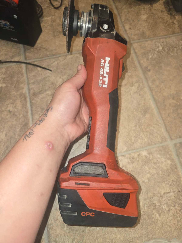 HILTI AG -A22 angle grinder  plus 2 batteries 18v in Power Tools in Saskatoon - Image 3