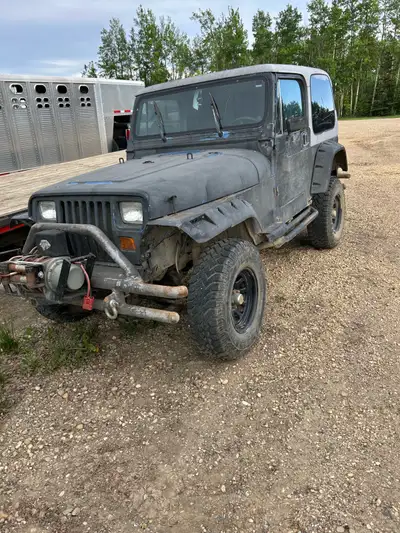 1989 jeep for sale. 350 engine. 5 speed transmission. $5000. obo Call 780- eight 64-zero 394.