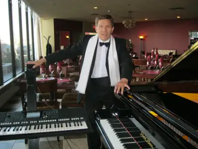 LIVE MUSICIAN, PIANO or ACCORDION (Portable Piano or accordion), View more