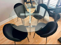 47” glass round dining table by CB2