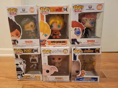Funko Pops. Tracer, Super Saiyan Goku, Moira, Piper, Dobby and Groot. Moira $25, rest $9 each.