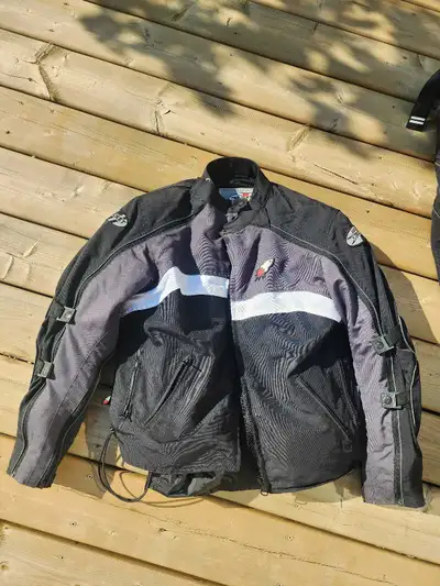 Womens medium Joe rocket jacket, and HJC extra small helmet. Everything is in great condition. Willi...